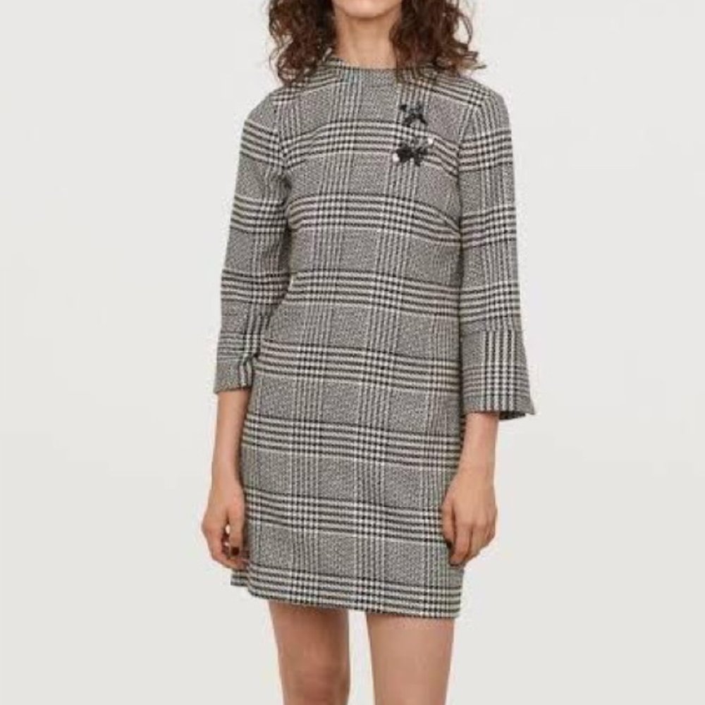 Houndstooth Dress with brooch embellishment detailing. Never been worn.